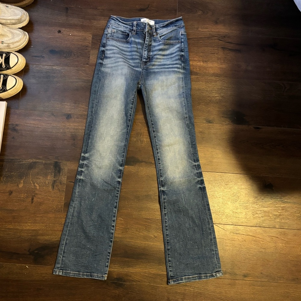 Buckle high rise boot cut jeans. Size 25x31.5.